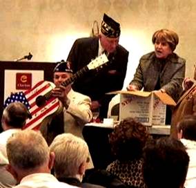 New York Congresswoman Louise Slaughter draws winning raffle ticket.